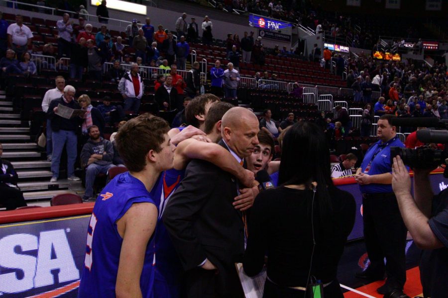 Coach+Jon+Kraus+and+seniors+Payten+Harre+and+Caleb+Frederking+are+interviewed+by+the+media+after+their+big+win+over+Annawan.