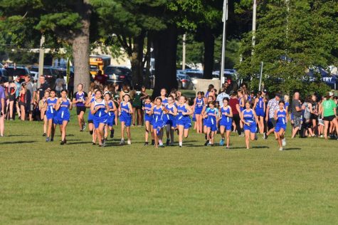 Jr. Lady Rocket runners take off at the start.