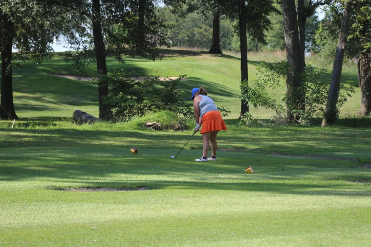 Kaylyn Cragen tees off at hole 3.