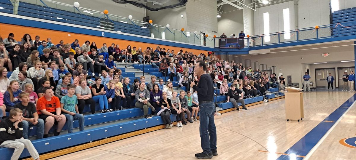 Frank Colston speaks to the student body at the assembly.