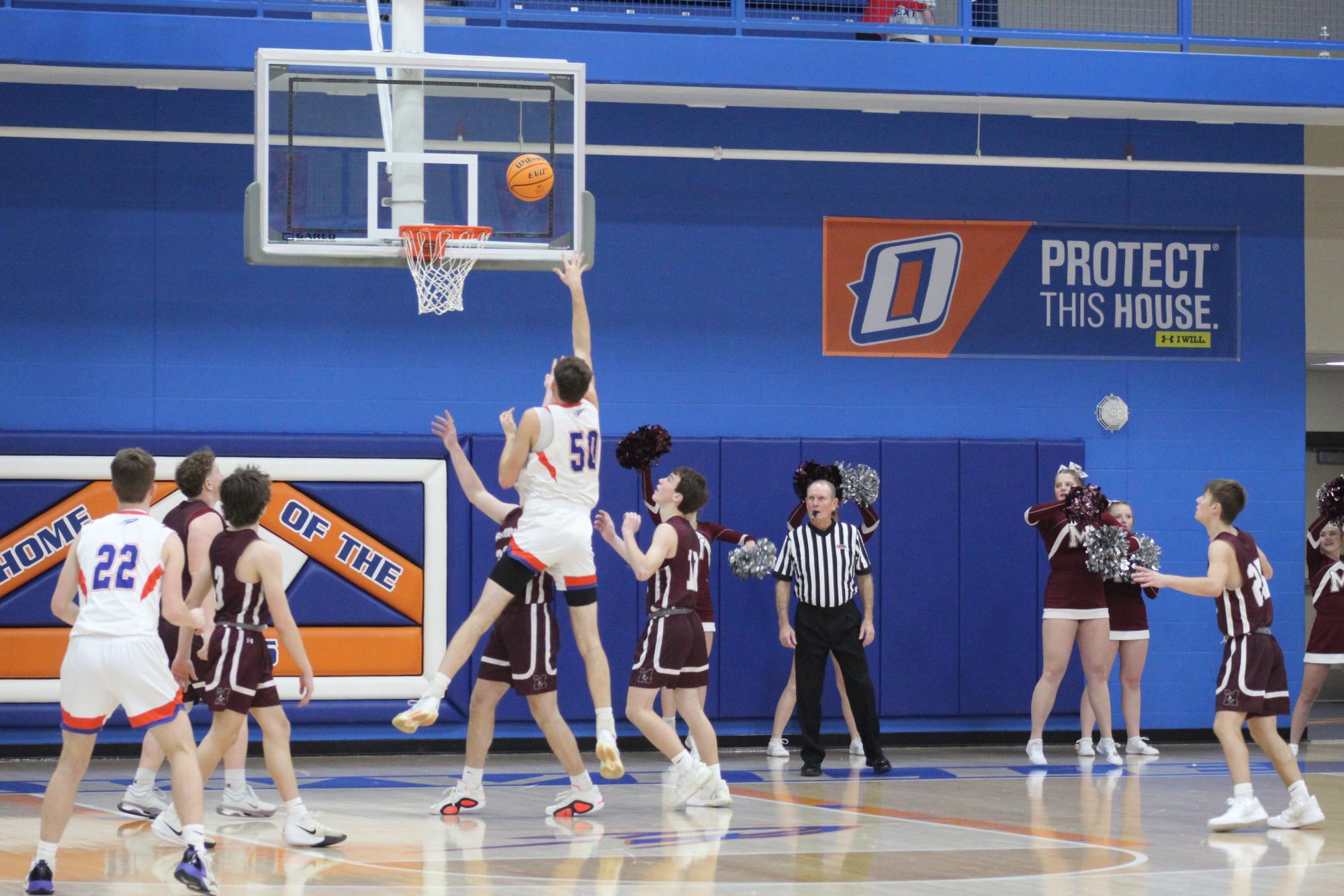 Aidan Anderson scoring a basket for the Rockets